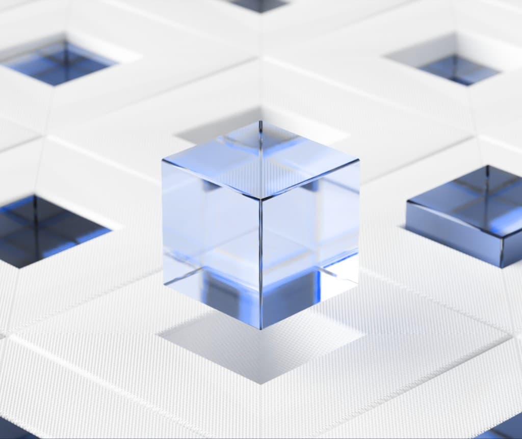 Translucent blue cubes on a textured white grid representing blockchain building blocks